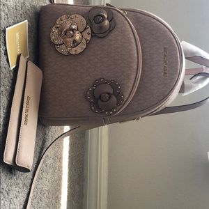 Michael kors backpack and matching wallet